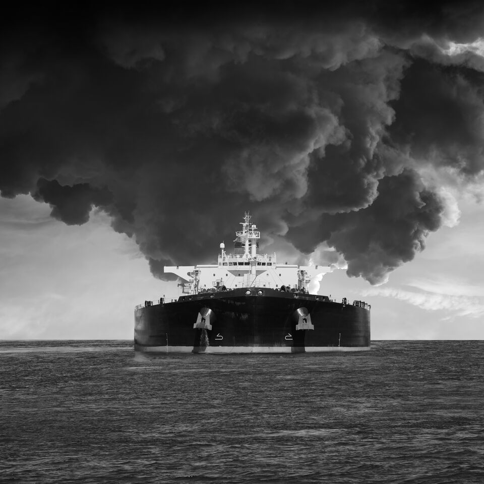 SINGLE-IMAGE_ship-with-smoke-cloud-in-background_jul24