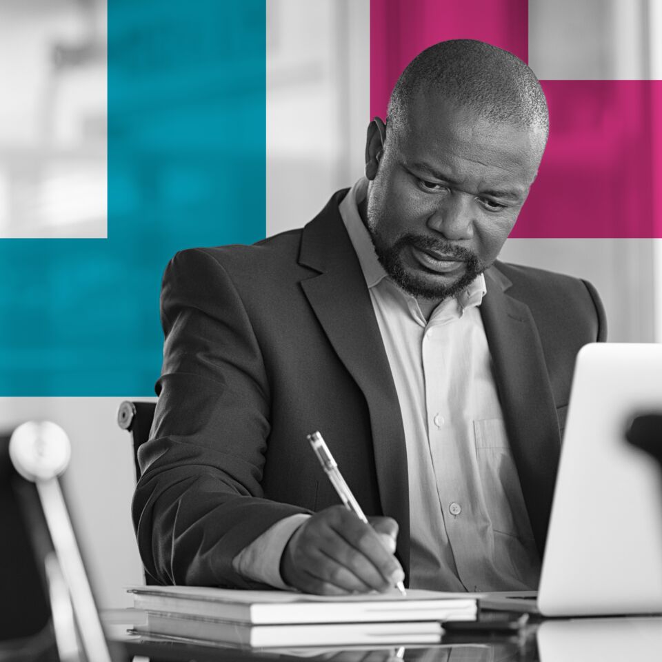 SINGLE-IMAGE_squares-man-with-pen-and-books-at-desk_feb24