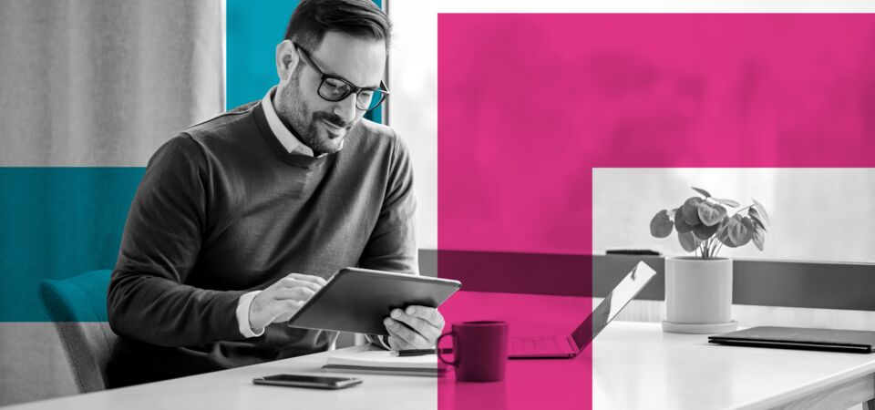 SINGLE-IMAGE_squares-man-with-tablet-at-desk-with-plant_feb24