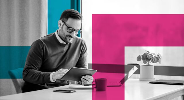 SINGLE-IMAGE_squares-man-with-tablet-at-desk-with-plant_feb24