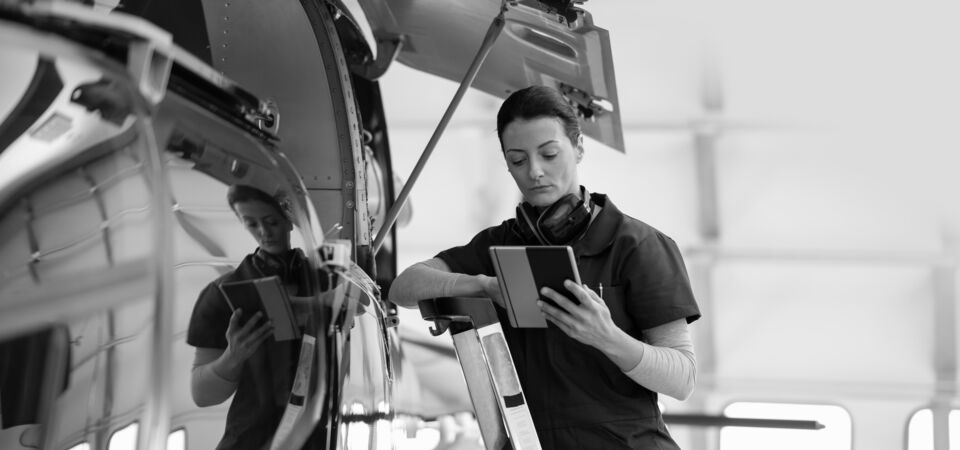 /bynder-asset/bynder:D65D6F5E-FDA7-4121-BF2DB632A4245515/Landscape_LG/SINGLE-IMAGE_female-engineer-with-tablet-checking-airplane_oct23.png?1749636899000