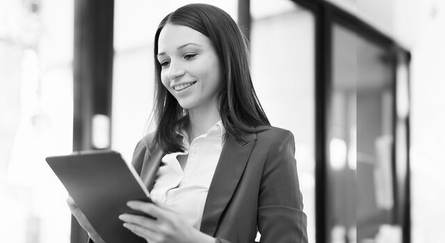 SINGLE-IMAGE_in-office-business-women-using-tablet_may24