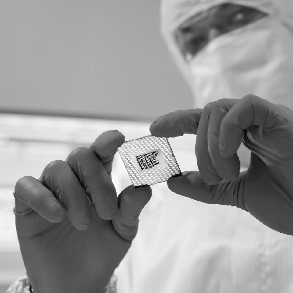 SINGLE-IMAGE_specialist-checking-microchip-manufacture_sept24