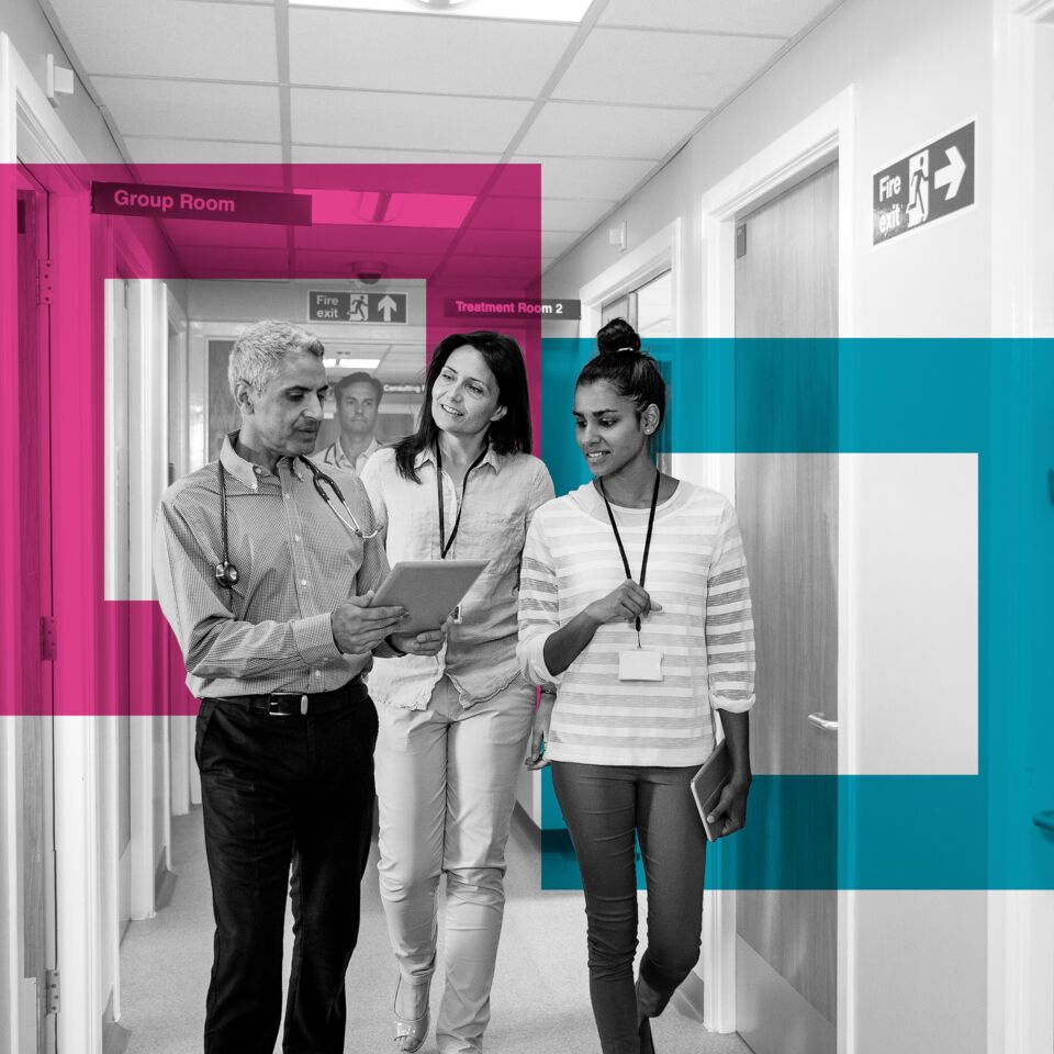 SINGLE-IMAGE_squares-doctors-walking-in-corridor_sept24