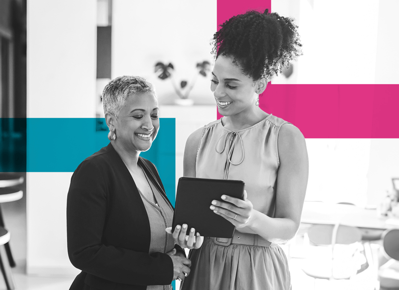 SINGLE-IMAGE_squares-business-womens-standing-in-office-with-a-tablet_may24